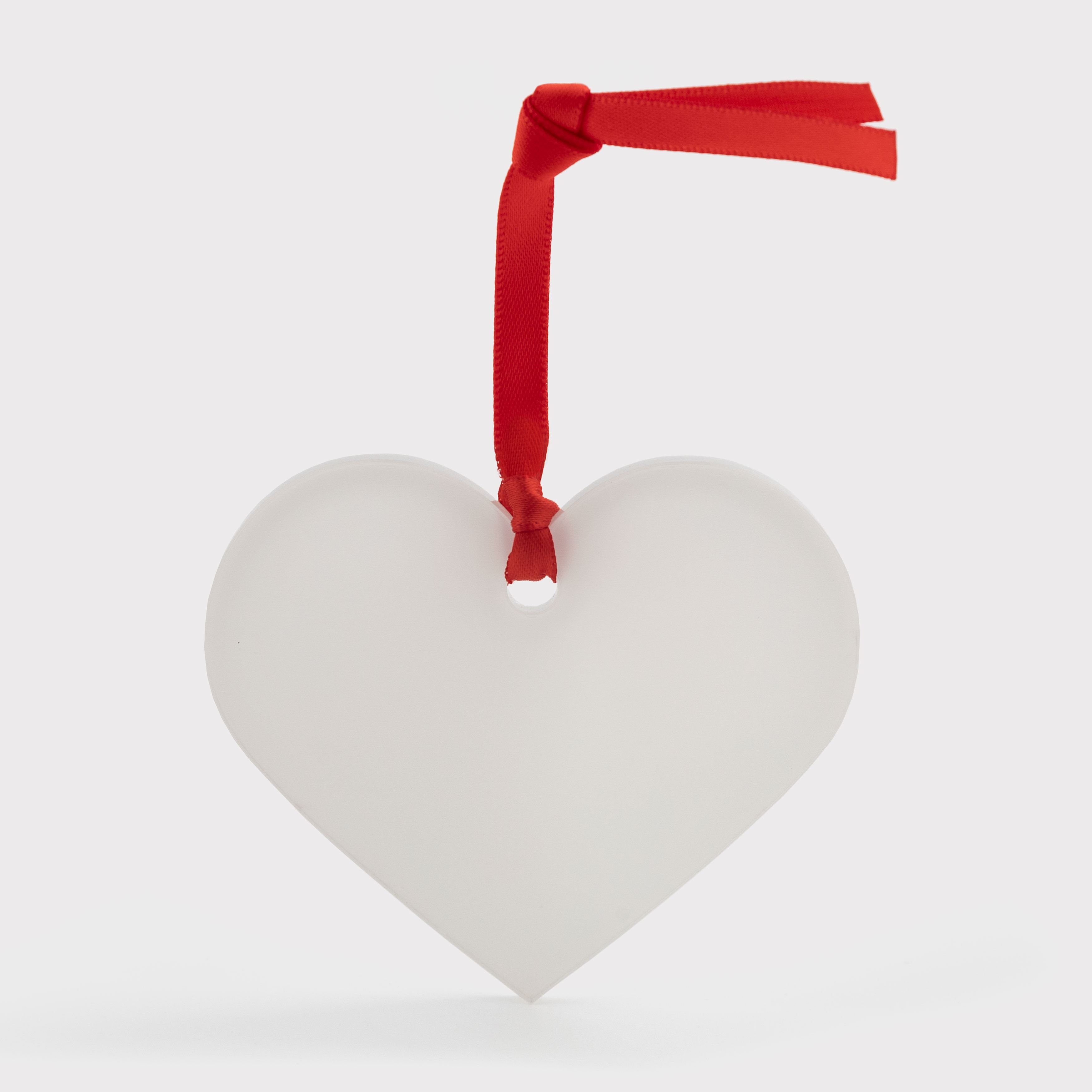 Ялинкова іграшка у формі серця акрилова одностороння (7,6*6,6 см) - фото 1 - Новорічні іграшки